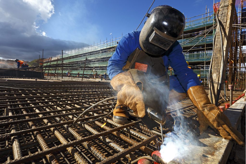 Welding worker welding outdoor